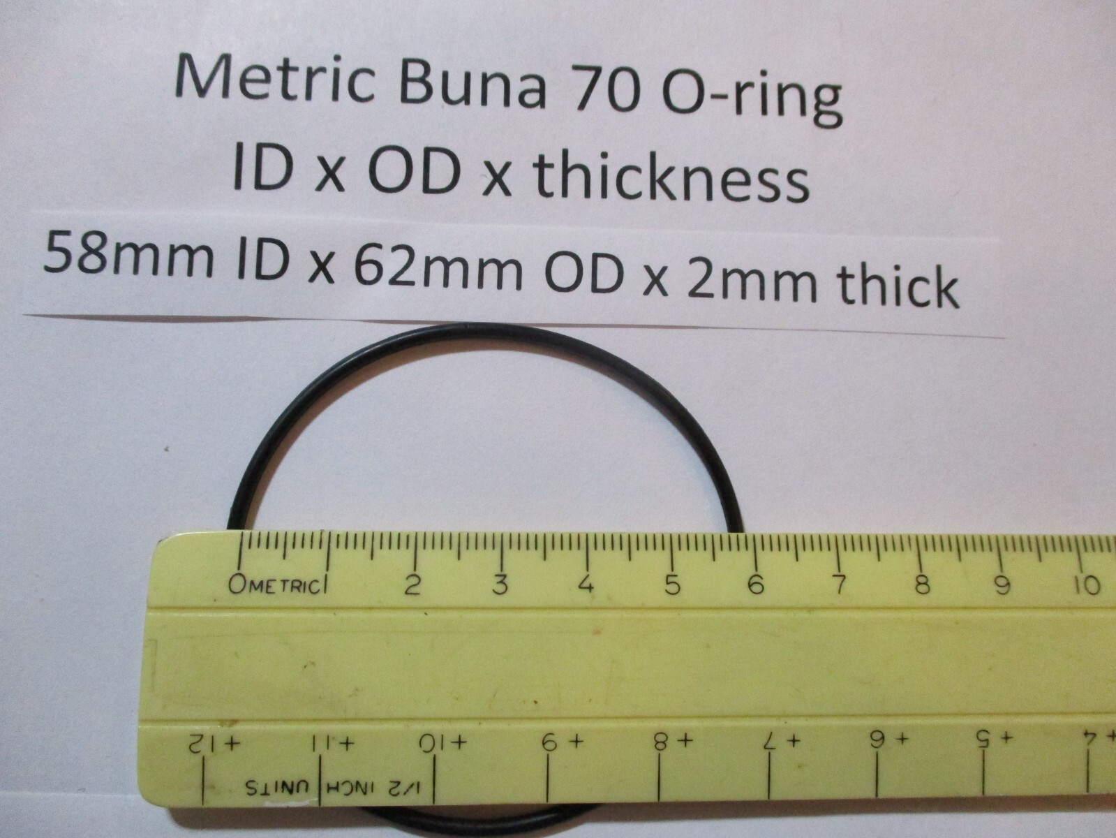 58mm ID x 62mm OD x 2mm thick O-ring. Buna-70. Quan 1.