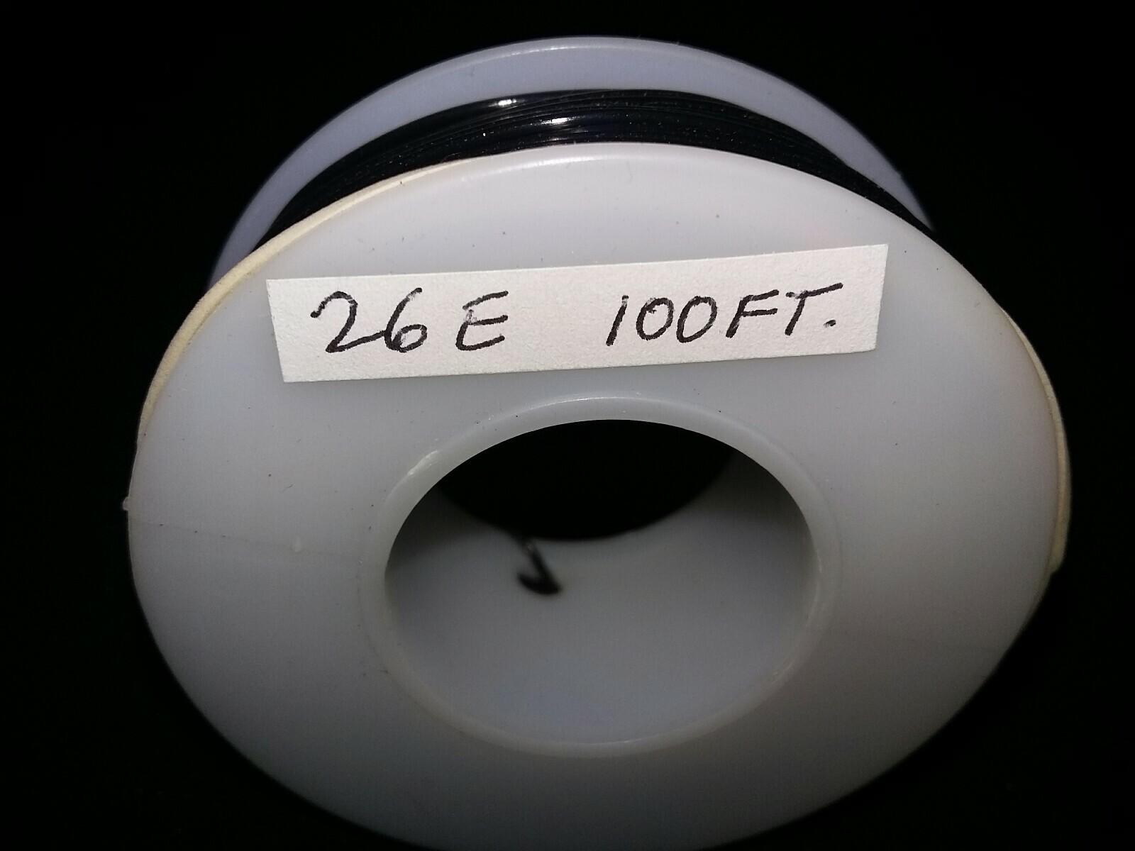 26 GA. Solid Strand Type “E” Teflon Black M16878/4 200°C @ 600V 100 ft. spool