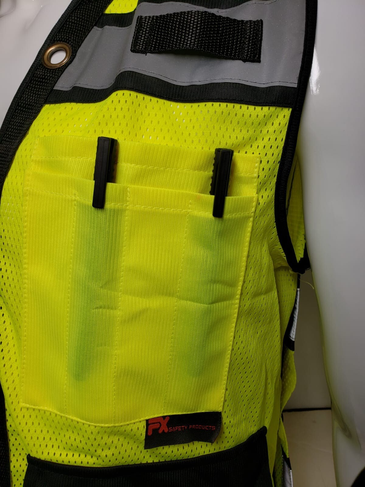 Surveyor vest with tablet pocket.