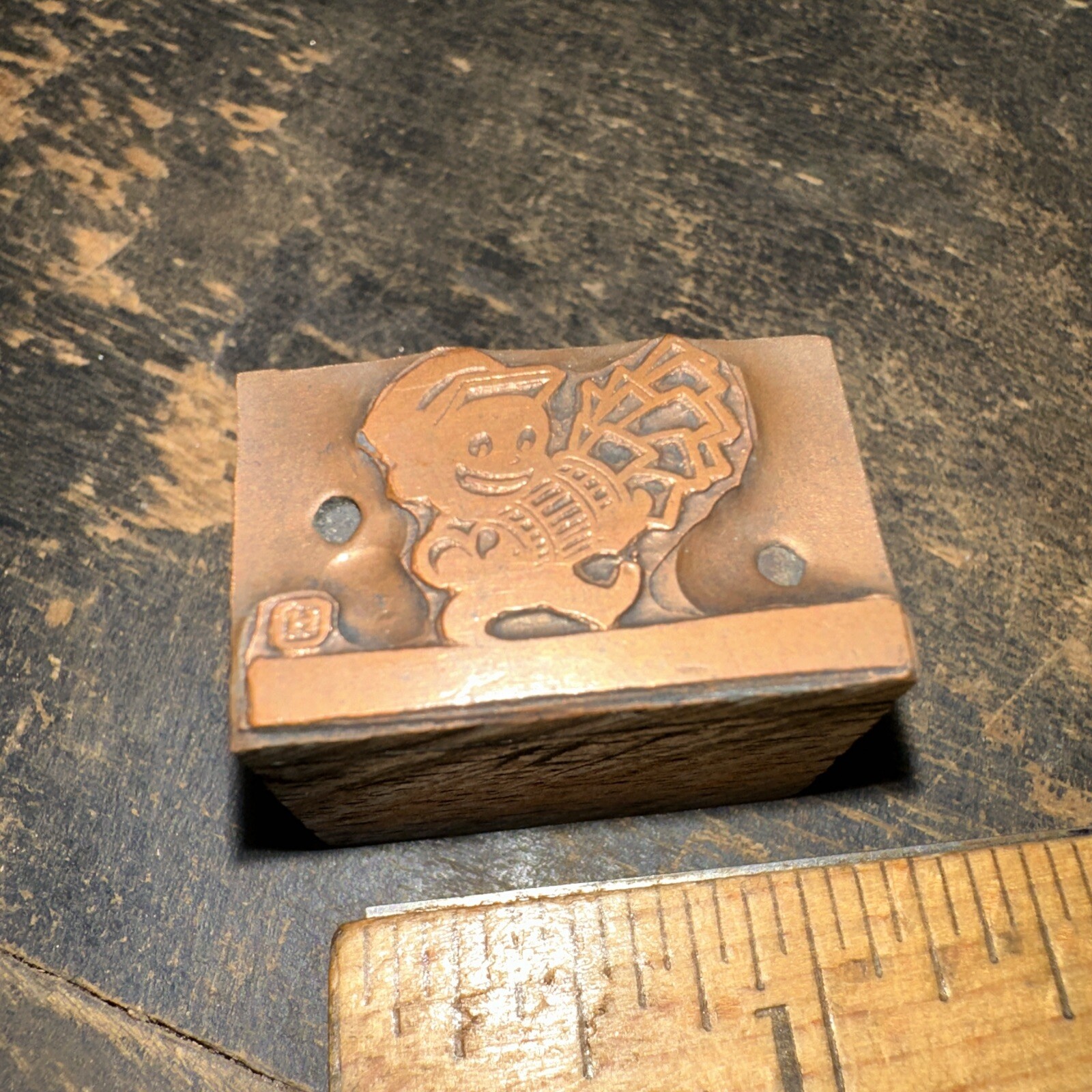 Printing Block “ smiling man carrying basket with paper or money?” Copper Face