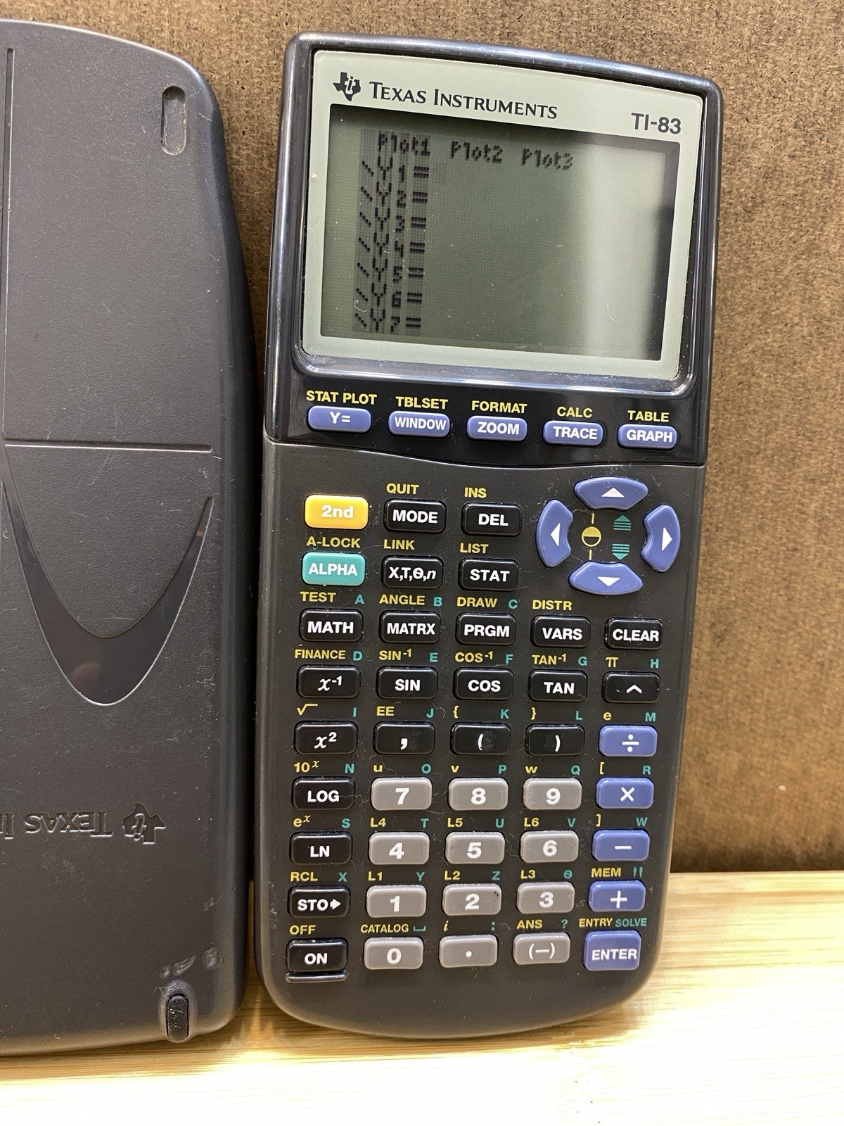 1990’s Texas Instruments TI-83 Graphing Calculator & Case W/new batteries