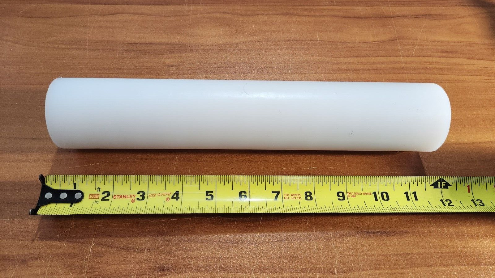 UHMW NATURAL ROD 2.25″ DIAMETER 12.00″ LENGTH