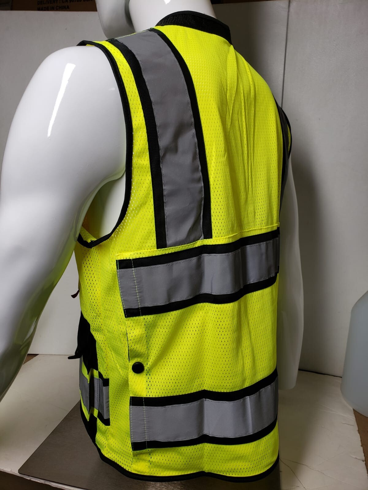 Surveyor vest with tablet pocket.