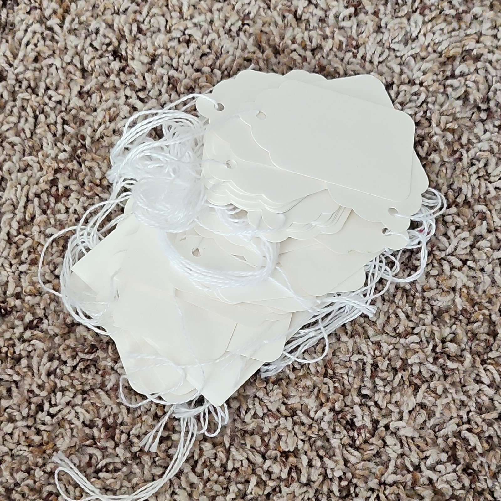 Scalloped White Pre-strung Paper Price Tags with Pre-Punched Hole