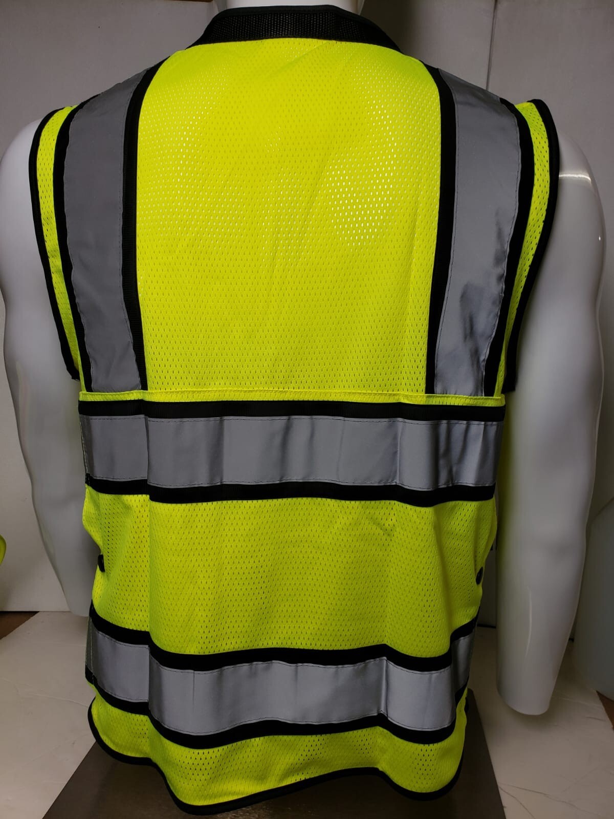 Surveyor vest with tablet pocket.