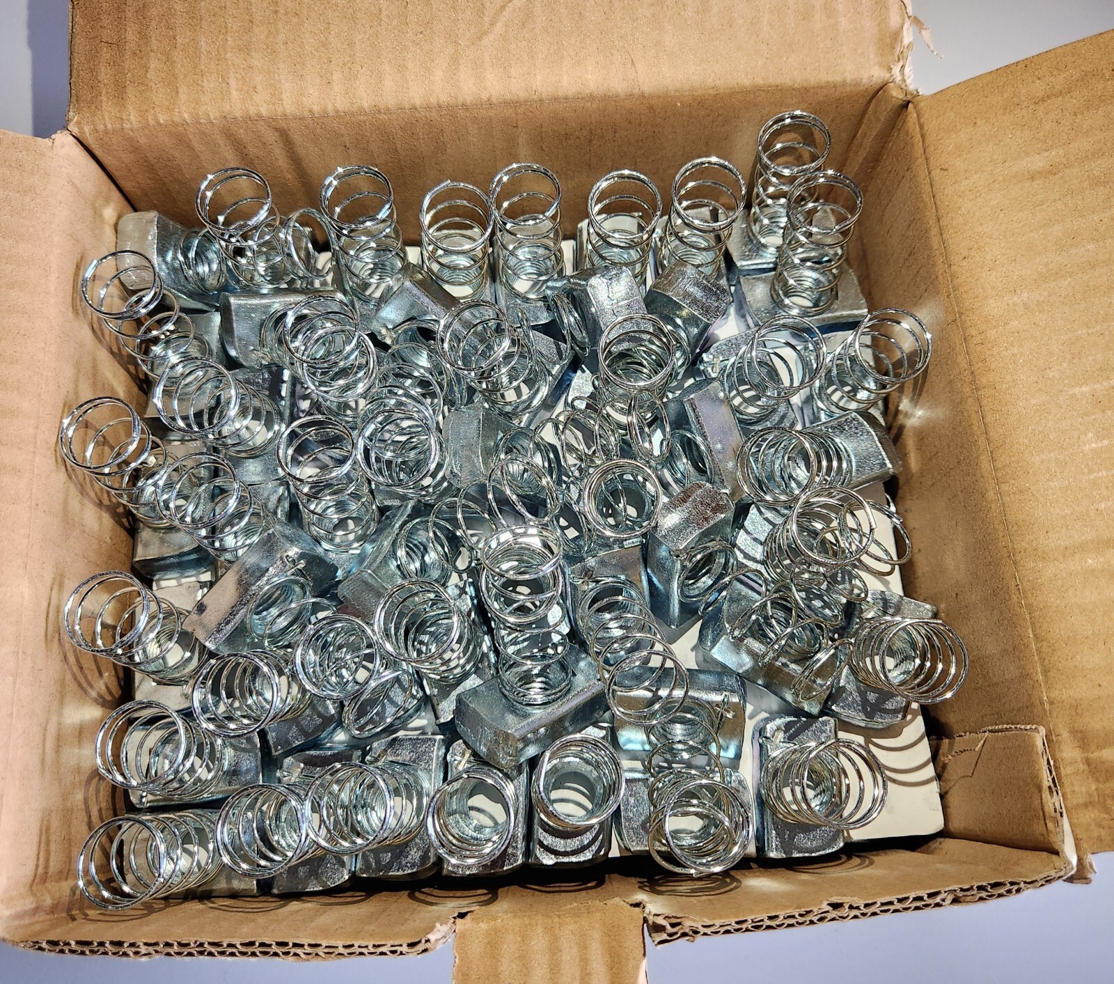 1/2″ GALVANIZED STRUT NUT WITH SPRING-SKU: 3108-EG ( ONLY SALE BOX OF 100 PCS )