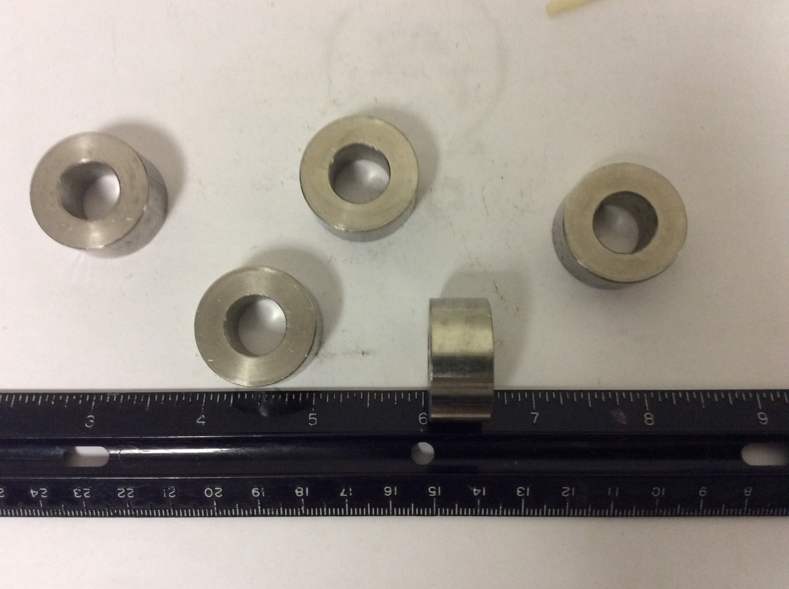 New. Qty (5) 1/2″ X 1/2″ X 1 1/16″ OD Stainless Spacers